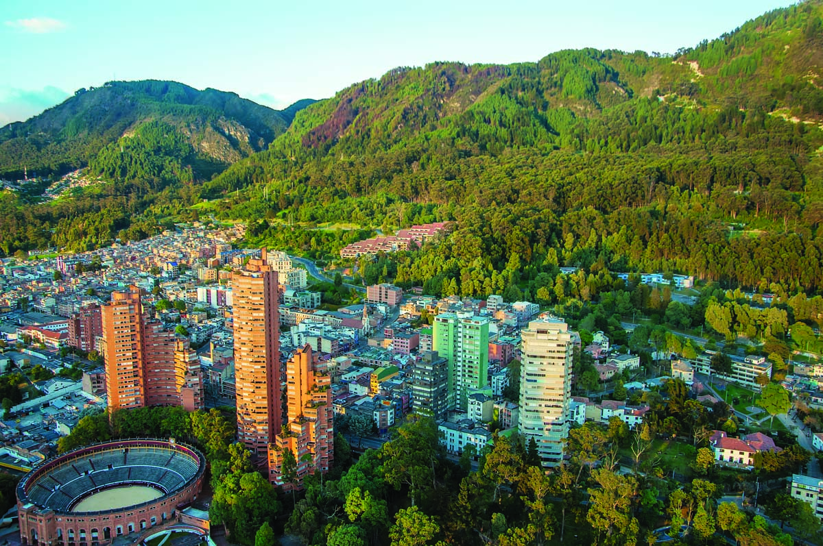 A view of the center of Bogota with the Andes in the background.